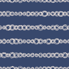 Geometric seamless pattern with hand drawn circles. Indigo background in sketchy minimal style. EPS10