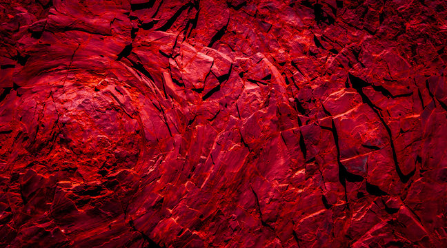 red rocks , abstract background - volcanic stone  texture   -