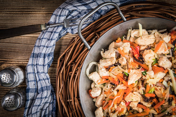 Fried chicken pieces with vegetables.