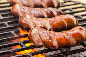 Grilling sausages.