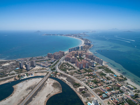 Aerial photo of buildings, villas and the beach on a natural spit of La Manga between the Mediterranean and the Mar Menor, Cartagena, Costa Blanca, Spain 15