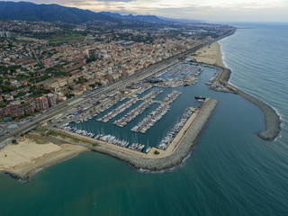 Obraz premium Aerial photo of sea port and a yacht club of Montgat at sunset, east of Barcelona, Spain 5