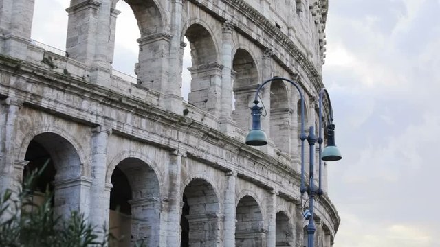 Tourist attraction of Rome. Close-up view of Colosseum in morning. Symbol of Italy. Landmark, traveling, destination, amphitheater, city, monument, travel.