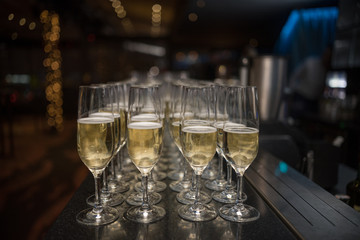 champagne  in cristal glasses on bar