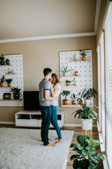 Happy young couple lifestyle in modern home