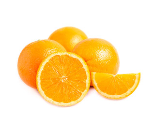 Fototapeta na wymiar Three fresh juicy oranges one half and a lobule (slice) of orange isolated on white background. Close photo