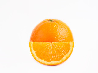Juicy fresh orange in front of him a slice of orange. Close photo