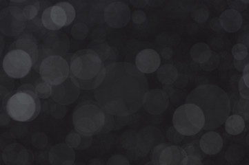 Snow bokeh texture on black background