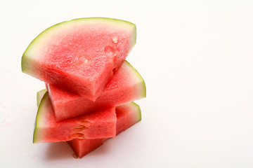 Watermelon isolated on white. Sliced fresh melon peices