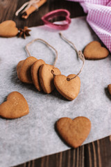 Baked cookies-hearts on the vintage wooden table. Valentine's Day