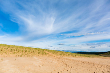 Fototapeta na wymiar Dunes with Blue Sky