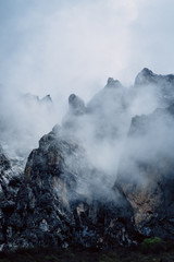 mountain peaks in fog
