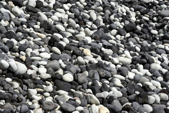 Round cut lava stones on the beach, southwest coast, island of Sao Miguel, Azores, Portugal, Europe