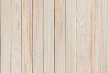 Fototapeta premium Natural background of new wooden light plank boards vertical