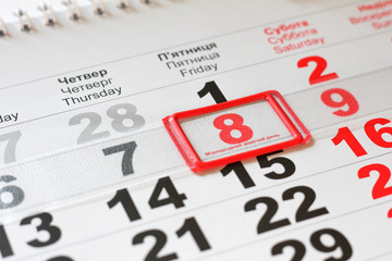 Calendar with red mark on 8 March. Concept: International Women's Day.