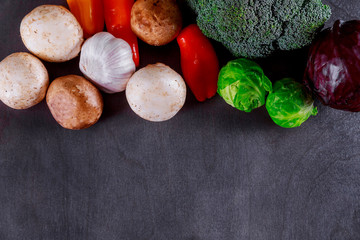 Vegetables on wood background autumn harvest. Rural still life from above free text space.