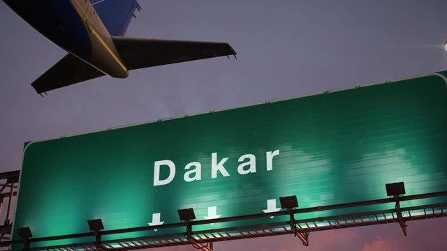 Airplane Take off Dakar during a wonderful sunrise