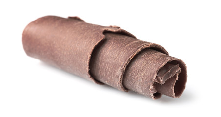 Curl of tasty chocolate on white background