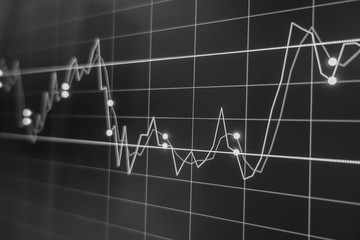 Stock exchange market in black and white on LED screen. Finance and economic concept.