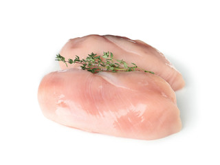 Raw chicken breasts with thyme on white background. Fresh meat