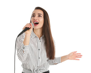 Young woman wearing casual clothes singing in microphone on white background