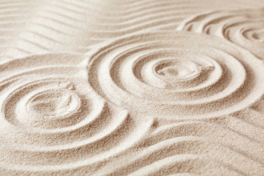 Zen Garden Pattern On Sand. Meditation And Harmony