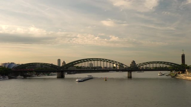 4K video clip of boats sailing on the River Rhine and trains on the Hohenzollern Bridge, Cologne, Germany