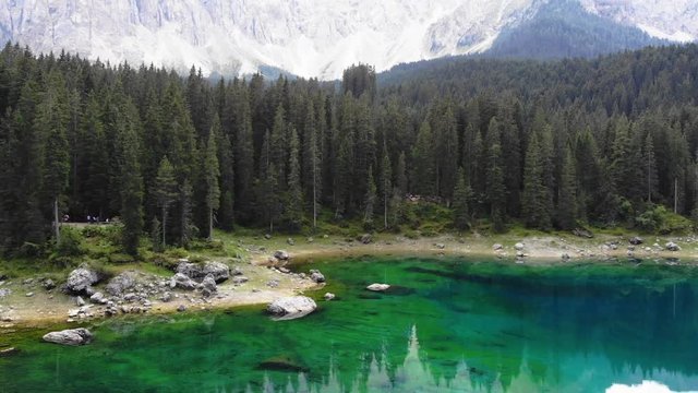 Drone aerial Carezza lake Italy Dolomites Alps