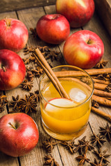Old fashioned apple beverage on the rustic background. Selective focus.