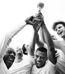 Fototapeta premium Soccer players team celebrating their victory