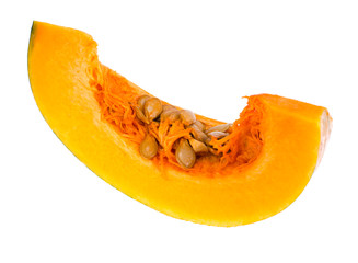 Orange pumpkin slices, seeds, isolated on white