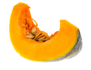 Orange pumpkin slices, seeds, isolated on white