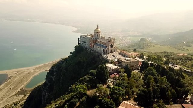 Drone flight around the sanctuary with the mediterranean Sea in the background