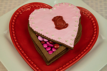 Heart shaped valentine sugar cookie box filled with candy