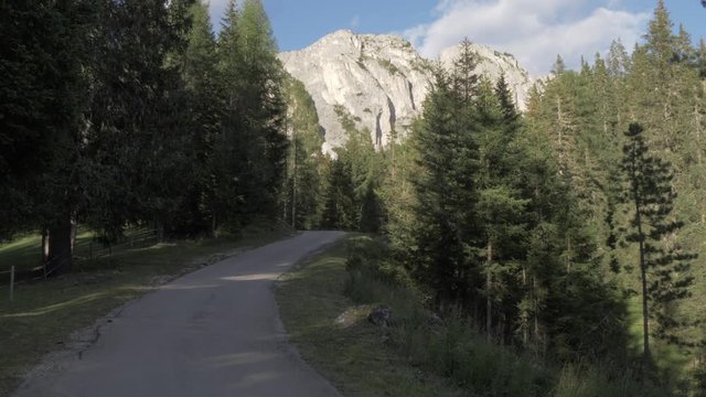 View of road and mountains leading to Castello di Andraz, Province of Belluno, Italian Dolomites, Italy, Europe
