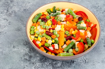 Bowl of mix frozen vegetables for cooking vegetarian dishes, healthy eating concept
