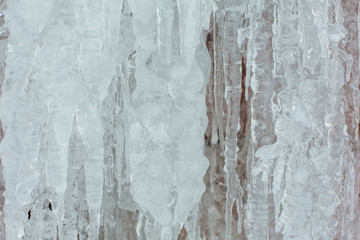 Very large and dangerous icicles close up