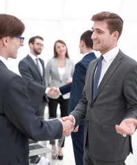 Fototapeta premium handshake of business partners after the briefing