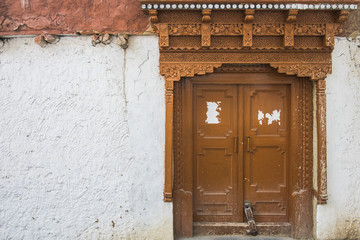 Ancient looking door way at a Tibetan monastery in Leh Ladakh, India