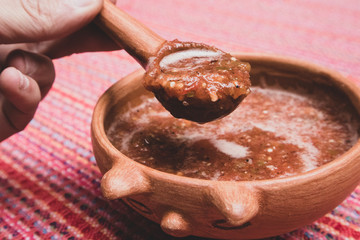 Serving Salsa of Chile de Arbol out of Clay Bowl in Mexico City