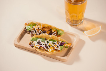 Traditional mexican taco with meat and vegetables. Latin american food.