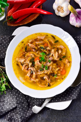 Traditional tripe soup in polish style with beef and vegetables