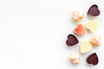 Heart-shaped confection for Valentine's day on white background top view copy space