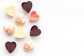 Heart-shaped confection for Valentine's day on white background top view space for text