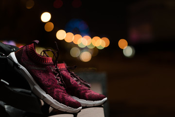 Sports shoes in the city park. The concept of sports lifestyle.