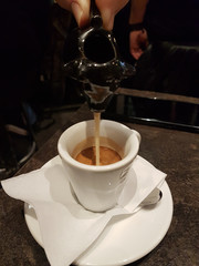coffee espresso in cafe wooden background milk sugar