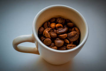 Cup with coffee grains