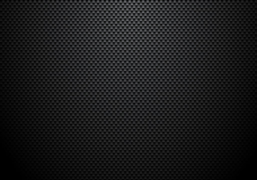 Carbon fiber background and texture with lighting. Material wallpaper for car tuning or service.