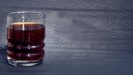 Drink in stanne on a dark background.