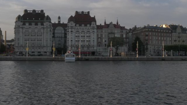 View from Nybrohamnen along grand buildings towards Junibacken, Stockholm, Sweden, Scandinavia, Europe